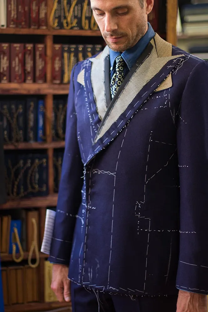 A bespoke suit being fitted during a tailoring appointment
